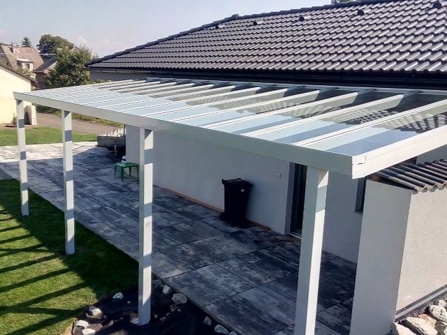 Jak sladit garážové stání s domem a zahradou